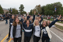 UNH students marching in the Homecoming parade