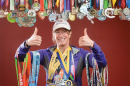 UNH alumna Kathy Stickney ’86 with running medals