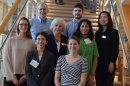 The winning student team poses with Dean Deborah Merrill-Sands, Department of Decision Sciences chair Roger Grinde, and faculty member Jing Wang.