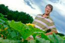 UNH professor emeritus J. Brent Loy with Slick Pik summer squash