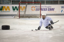 Dan Santos '17 practices sled hockey at the Whitt for the Northeast Passage Wildcats team