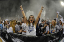 Hailey Simpson ’18 cheering in the student section at a UNH football game