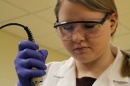 Student Rachel Main is shown in the biotech lab at Great Bay Community College.