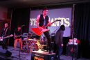 The Slants on stage at a show