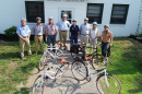 UNH facilities staff with bikes and helmets