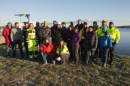 Large group of hydrographers at the edge of the ocean