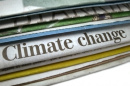 Image of a newspaper with the headline "climate change"