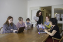 Faculty and staff at the University of New Hampshire libraries around a table