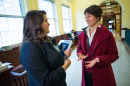 UNH professor Monica Chiu speaking with a student in Murkland Hall