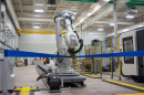 A robot at work in UNH's John Olson Advanced Manufacturing Center