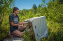 UNH student conducting research at Sallie's Fen, Barrington, NH