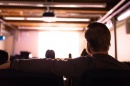 People gathered in UNH Manchester theatre to watch the films of cinema arts students