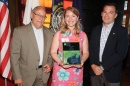 Abigail Lyon receives award plaque from Gulf of Maine Council.