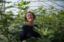 Becky Sideman in a field of plants