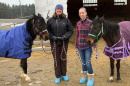 UNH's Brenda K. Hess-McAskill  and Julia Zabkar '21 with two rescue ponies