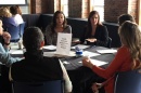 Politics & society majors Jaisha Jimenez ’19 and Kimberly Morrow ‘19 debate House Bill 628, the creation of a family and medical leave insurance system, during the Present and Defend session at the Undergraduate Research Conference.