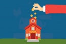 Graphic of a cartoon hand dropping coins into a school building.