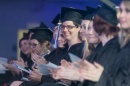Students clapping at UNHM commencement