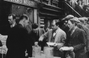 New York City: in the absence of substantial government relief programs during 1932, free food was distributed with private funds in some urban centers to large numbers of the unemployed. National Archives.