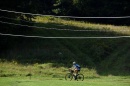 A photograph of a bike rider on trails in the Upper Valley region