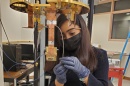 Adrika Dasgupta works on space detectors in a lab. 