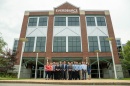 UNH graduates gather outside of Eversource in Manchester.