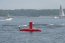 A red autonomous surface vessel called Drix in Portsmouth Harbor