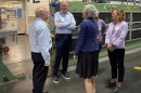 UNH leaders tour SubCom facility