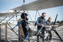 Male student in the cockpit of an ultralight aircraft designed by a team of UNH students