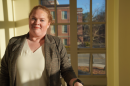 Katie Godshall poses in front of a window at UNH