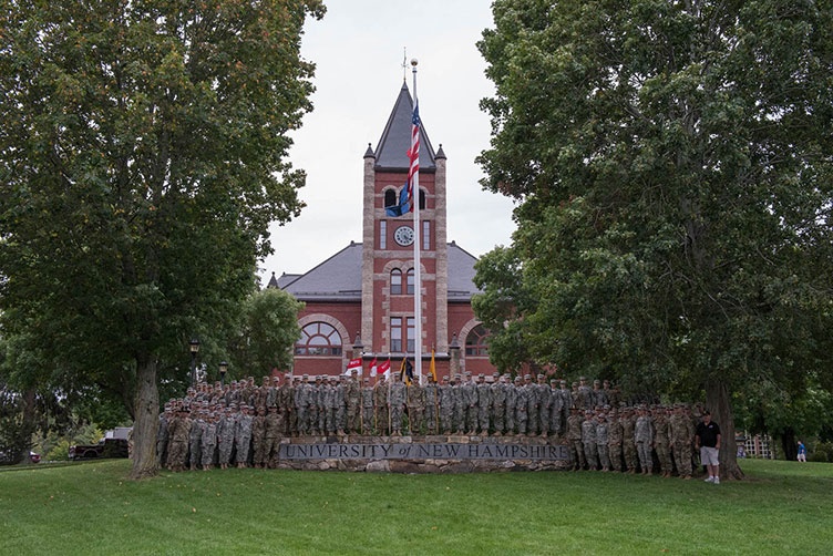 UNH ROTC Cadets and others standing in front of Thompson Hall during the 2017 ROTC Contracting Ceremony