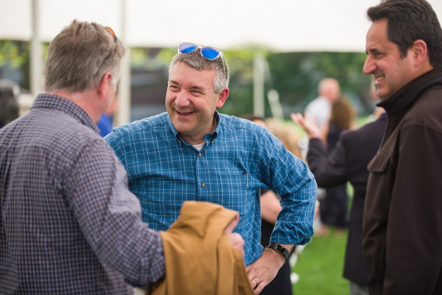 Outgoing UNH president Mark Huddleston with campus community members