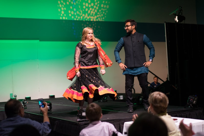 Students celebrating on stage