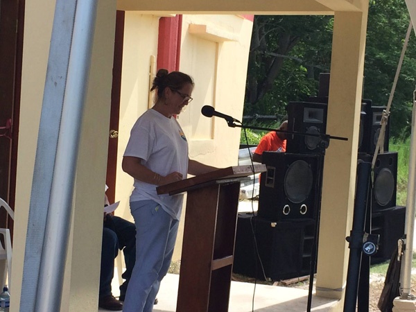 photo of woman at podium