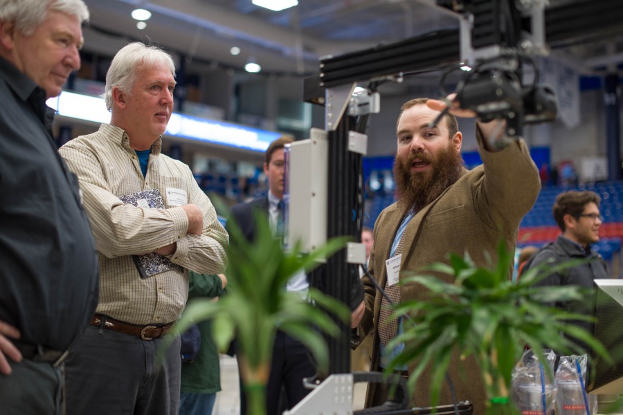  A University of New Hampshire student presenting research results during the 2018 Interdisciplinary Science and Engineering Symposium, part of the annual UNH Undergraduate Research Conference