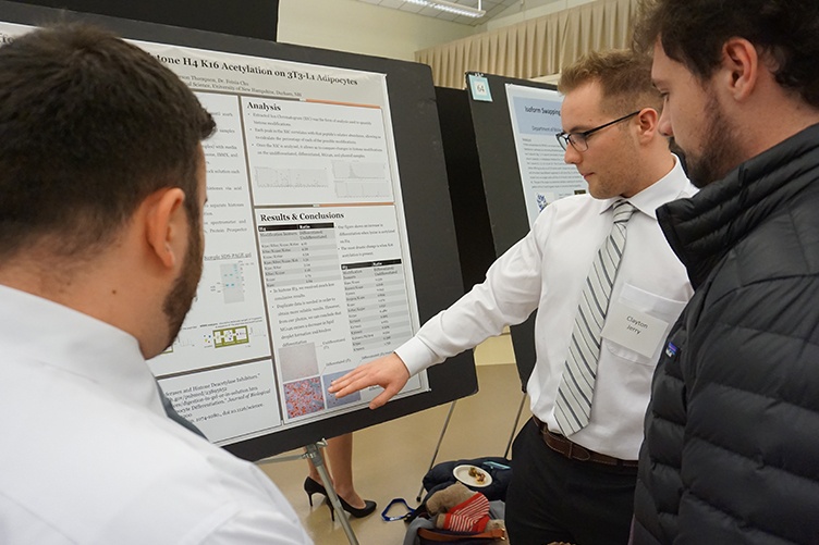 Clayton Jerry '18 and Anderson Thompson '18 at the UNH Undergraduate Research Conference