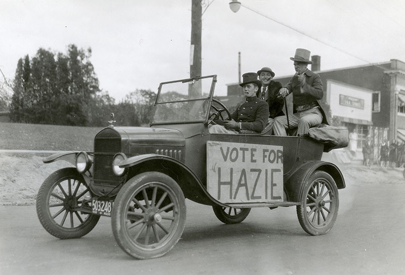 1930 Mayoralty campaign candidate Edward Haseltine and his managers in a car with a Vote for Hazie sign on the side