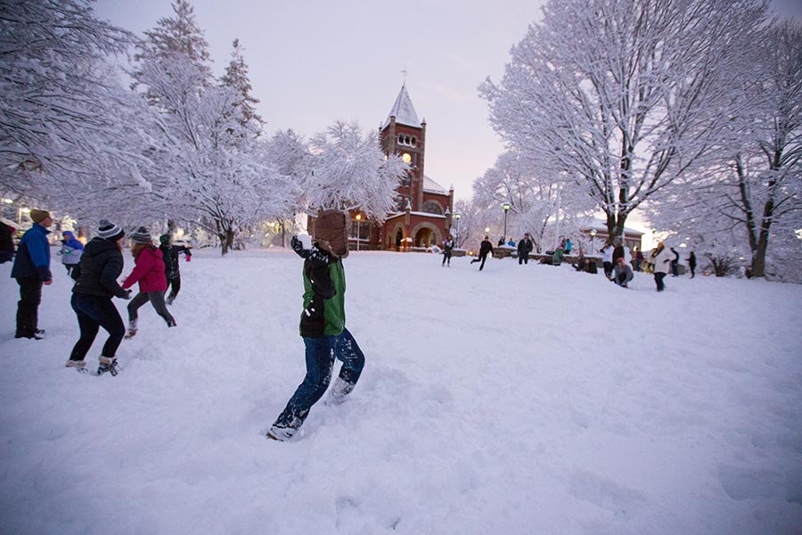 Snowball fight on Thompson Hall lawn at UNH