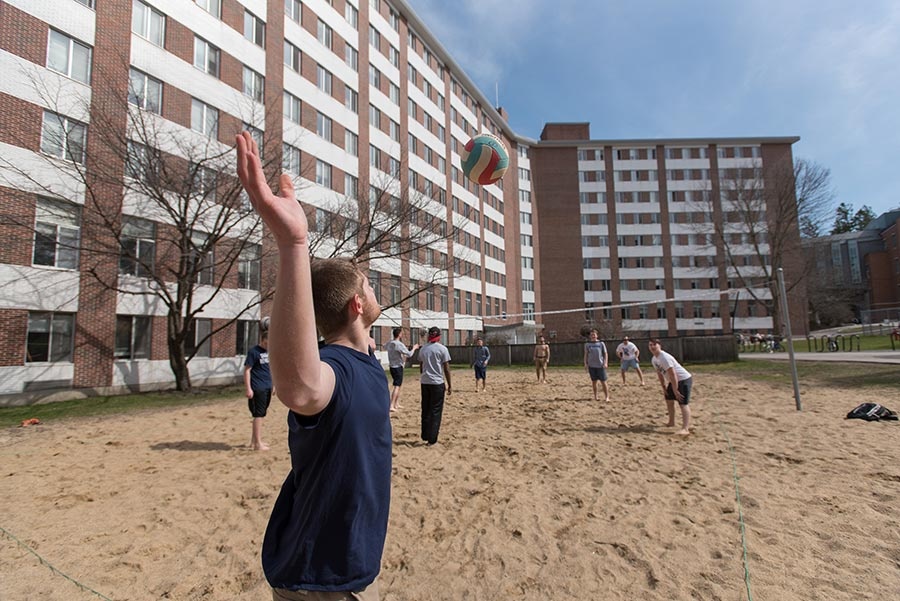 Volleyball game behind Stoke Hall at UNH