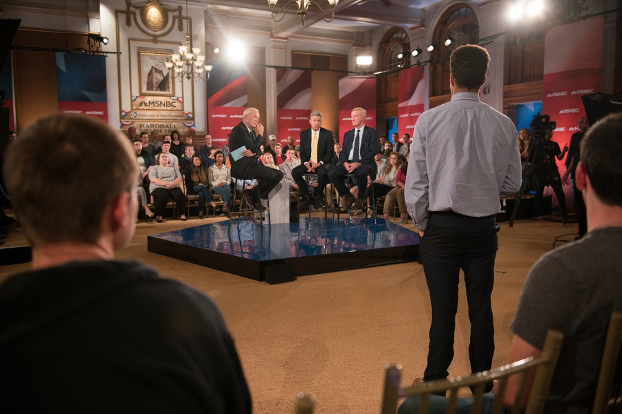 A UNH student addressing presidential candidate Gary Johnson