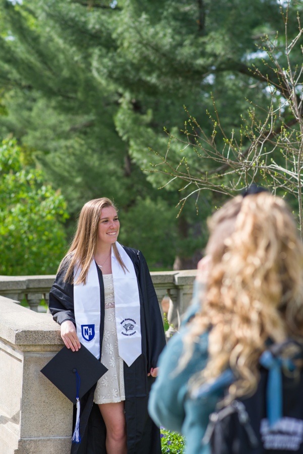 UNH seniors pose for pre-graduation pictures on campus during the week before commencement