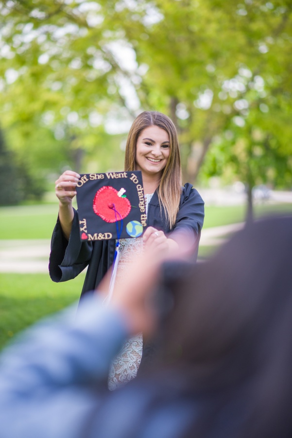 UNH seniors pose for pre-graduation pictures on campus during the week before commencement