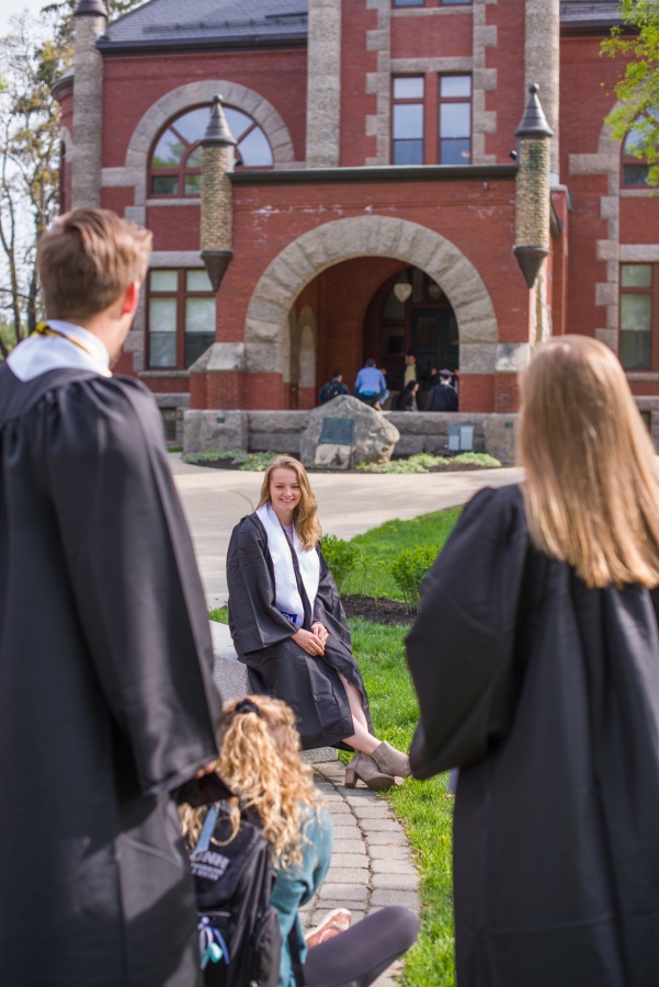 UNH seniors pose for pre-graduation pictures on campus during the week before commencement