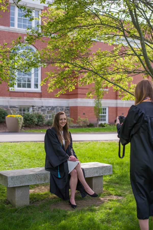 UNH seniors pose for pre-graduation pictures on campus during the week before commencement