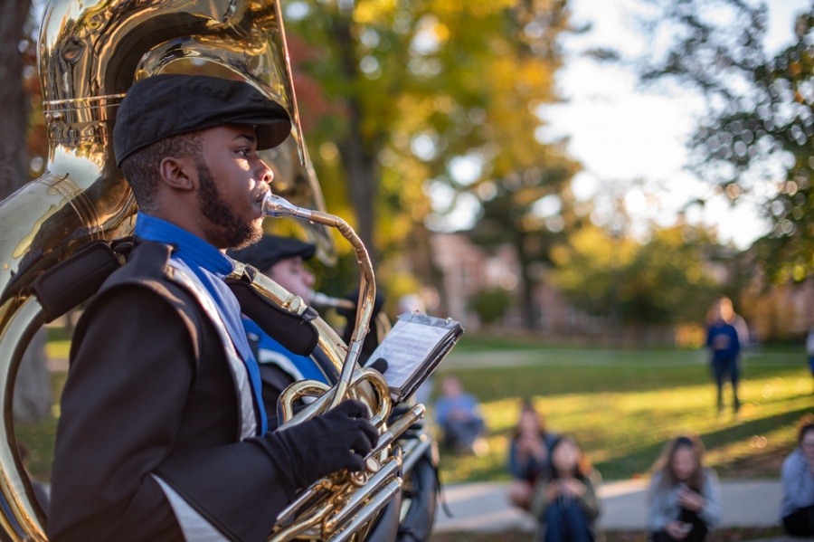 A student in UNH's Homecoming Parade 