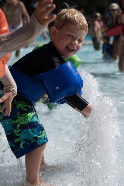 kids playing at the opening of UNH's new outdoor pool