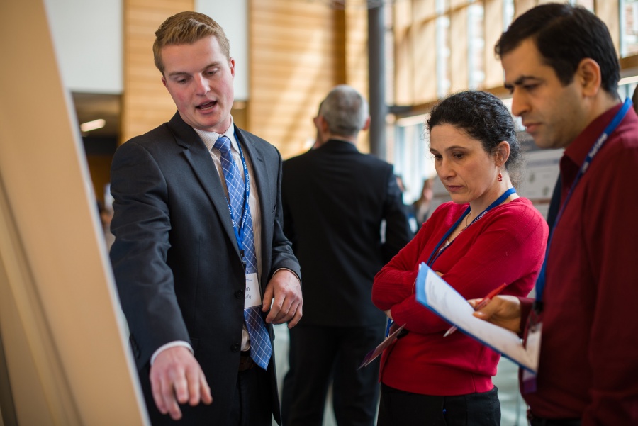 A University of New Hampshire student presenting research results during the 2018 Paul College of Business and Economics Undergraduate Research Conference