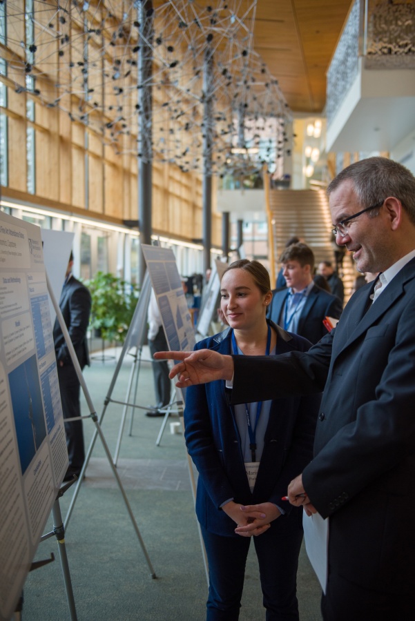 A University of New Hampshire student presenting research results during the 2018 Paul College of Business and Economics Undergraduate Research Conference