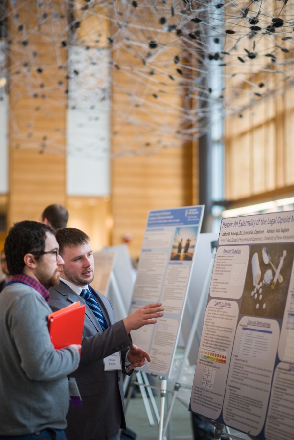 A University of New Hampshire student presenting research results during the 2018 Paul College of Business and Economics Undergraduate Research Conference