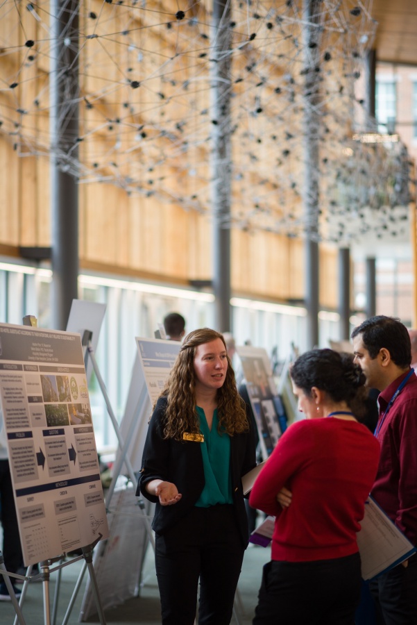 A University of New Hampshire student presenting research results during the 2018 Paul College of Business and Economics Undergraduate Research Conference